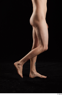 Falco White 1 calf flexing nude side view 0001.jpg